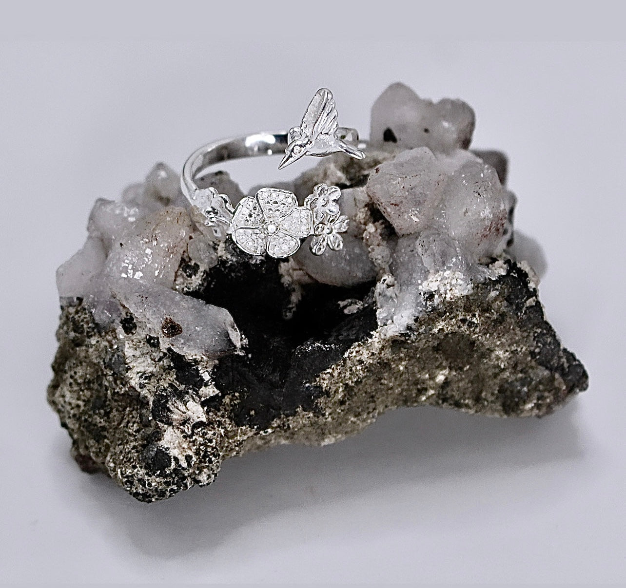 HUMMINGBIRD OVER FLOWERS Ring